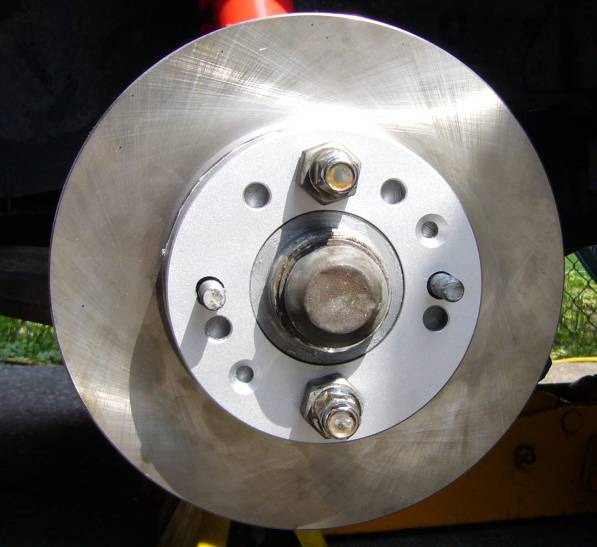 Image of 4 piston rotor installed on 4 lug hub