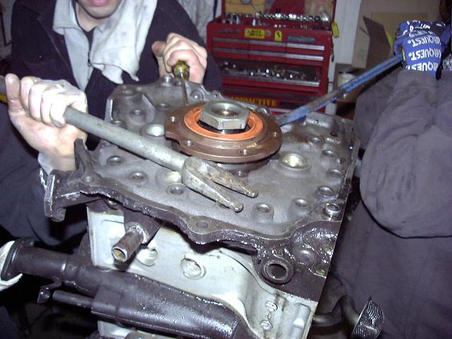 Prying out rear stationary gear.
