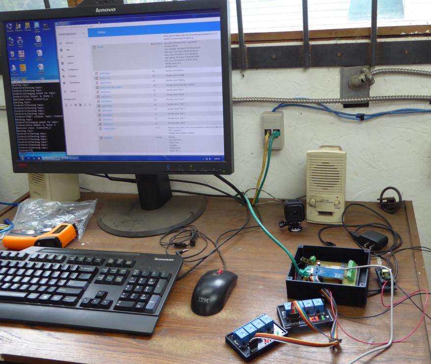 Image of testing Nano Board on bench, connected to Ethernet and power, Home Assistant in background showing states