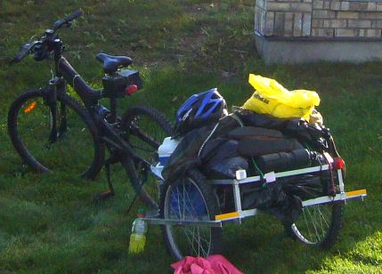 Bicycle cart fully loaded mid-journey