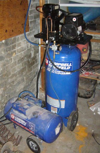 Upgraded Campbell Hausfeld compressor finished, in basement, and connected to shop air