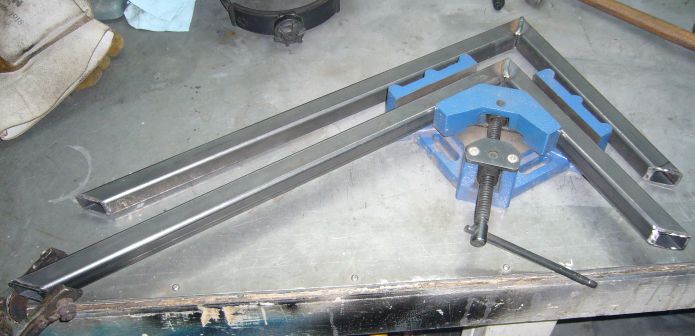 Frame being welded in vice