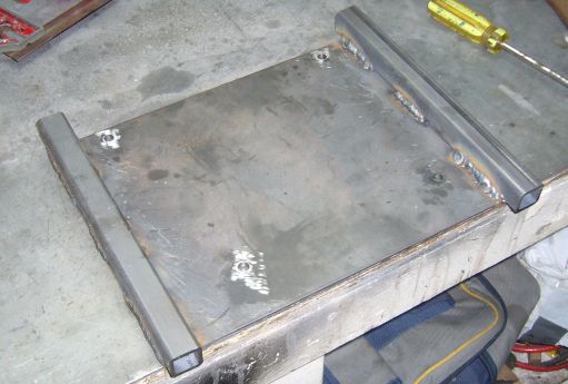 Mounting plate for stock Campbell Hausfeld compressor tank