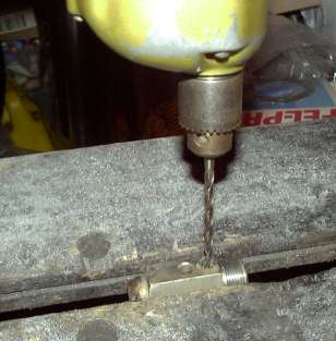 Drilling out the roll pin